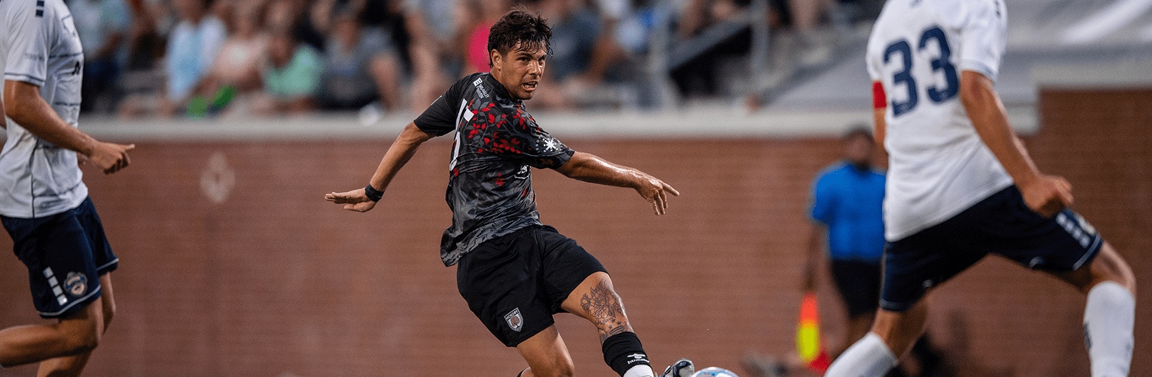 Hickory FC player, Bautista Schmidt, with a hard pass during the match with Charlotte Independence FC on June 27, 2026 at Moretz Stadium.