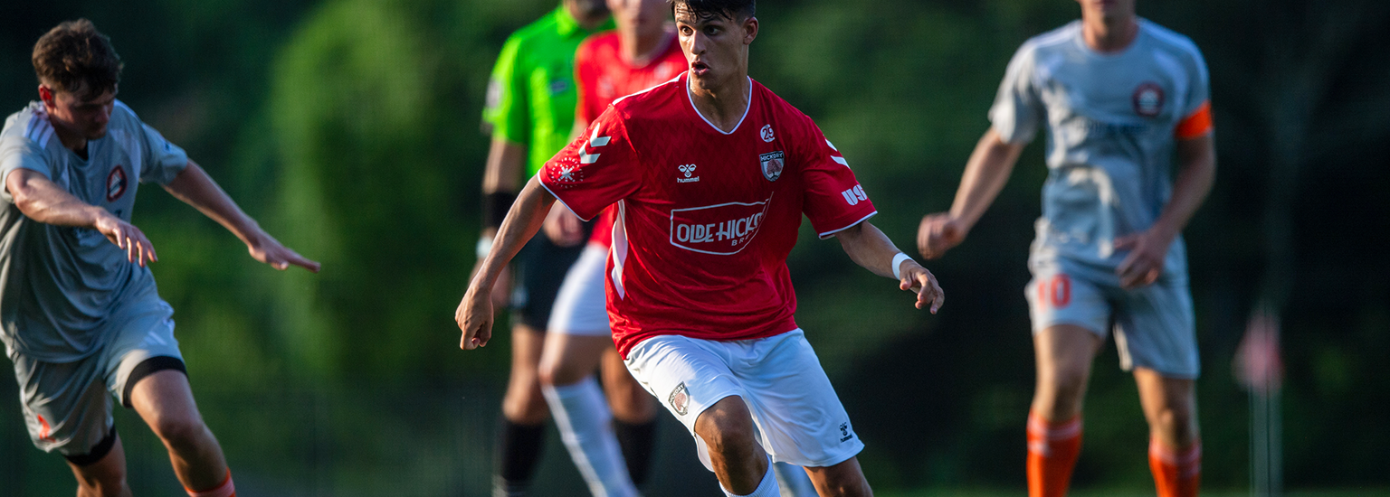 Hickory FC player, Mario Albert, advancing the ball during match play again Charlotte Eagles on June 30, 2026.